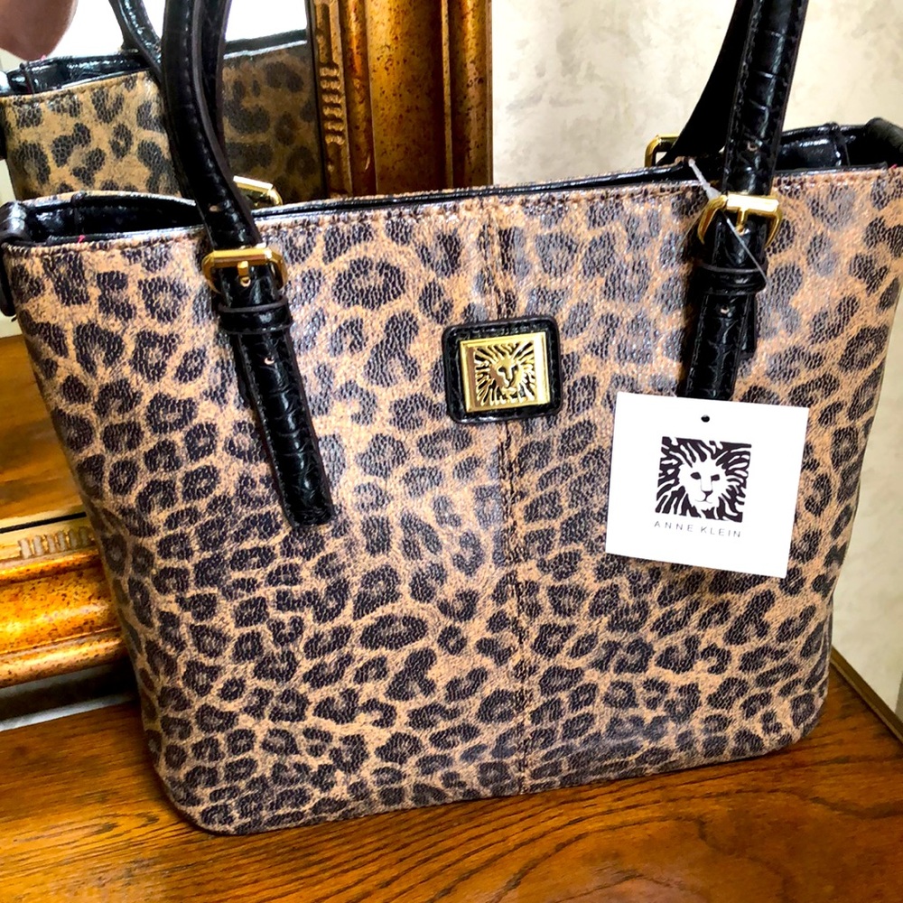 New Anne Klein animal print tote bag.  Outside pocket.  Pink inside w/storage.